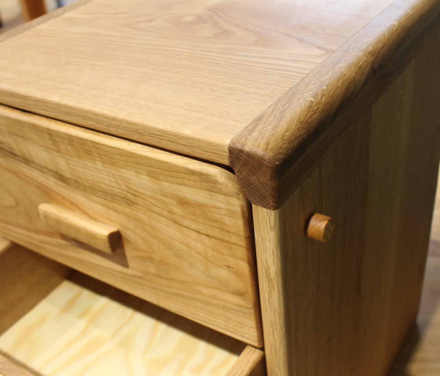 Andvari — top corner, the peg lock pulled out and a drawer open